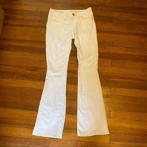 White flare bell bottom low rise jeans